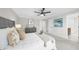 Spacious main bedroom with a large bed, dresser and artwork on the wall at 11815 Mountain Laurel Dr, Roswell, GA 30075