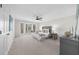 Spacious main bedroom with large windows and a cozy sitting area at 11815 Mountain Laurel Dr, Roswell, GA 30075