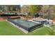 Aerial view of the community tennis courts, a perfect place for friendly matches at 11815 Mountain Laurel Dr, Roswell, GA 30075