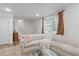 Living room with neutral walls, a comfortable couch, and a glass coffee table at 3147 Buford Ne Hwy # 8, Brookhaven, GA 30329