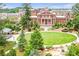 An aerial view of a large brick building surrounded by a park-like setting with trees and green spaces at 3988 Dover Ave, Alpharetta, GA 30009