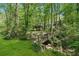 Foot bridge in wooded backyard at 3988 Dover Ave, Alpharetta, GA 30009