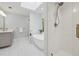The luxurious bathroom is equipped with a glass-enclosed shower and modern fixtures at 3988 Dover Ave, Alpharetta, GA 30009
