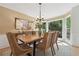 Bright dining room with a wood table, seating for six, and an abundance of natural light at 3988 Dover Ave, Alpharetta, GA 30009