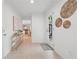 The entryway of this home welcomes guests with neutral tiled floors and modern decor and adjacent Living Room at 3988 Dover Ave, Alpharetta, GA 30009