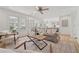 Bright living room with hardwood floors and access to the kitchen at 3988 Dover Ave, Alpharetta, GA 30009