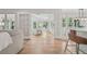 Living room featuring an open floor plan, hardwood floors, and lots of natural light at 3988 Dover Ave, Alpharetta, GA 30009