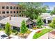 Exterior of restaurant with outdoor patio and landscaping, situated beside a grassy area and sidewalk at 3988 Dover Ave, Alpharetta, GA 30009