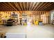Spacious unfinished basement area with exposed beams offers lots of potential at 4149 Yancey Rd, Douglasville, GA 30135