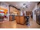 Open-concept kitchen with an island, bar stools, and lots of cabinet storage at 4149 Yancey Rd, Douglasville, GA 30135