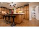 Spacious kitchen with island, breakfast bar, and ample cabinet storage at 4149 Yancey Rd, Douglasville, GA 30135