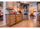 Kitchen with built-in appliances, wood cabinetry, and granite countertops at 4149 Yancey Rd, Douglasville, GA 30135