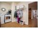 Bright laundry area featuring a washer, dryer and storage for clothes, supplies and other items at 4149 Yancey Rd, Douglasville, GA 30135