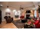 Comfortable living room with fireplace, ceiling fan, and ample seating at 4149 Yancey Rd, Douglasville, GA 30135
