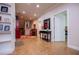 Hallway with neutral walls, recessed lighting and access to the stairs and basement area at 4149 Yancey Rd, Douglasville, GA 30135