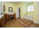 Elegant main bathroom featuring a tub, vanity, and adjacent dressing table at 4149 Yancey Rd, Douglasville, GA 30135