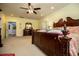 Warm and inviting main bedroom featuring a carved wood bed frame at 4149 Yancey Rd, Douglasville, GA 30135