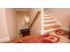 Staircase descends to a lower level with wooden steps and landing at 4149 Yancey Rd, Douglasville, GA 30135