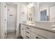 Modern bathroom featuring double sinks, subway tile shower, and plenty of cabinet space at 1100 Wylie Se St # A, Atlanta, GA 30316