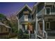 Charming home featuring a cozy front porch, red door, and beautiful architectural details at 1100 Wylie Se St # A, Atlanta, GA 30316