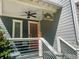 Charming home exterior featuring a covered porch with a ceiling fan at 1100 Wylie Se St # A, Atlanta, GA 30316