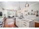 Kitchen open to the living area, featuring pendant lighting and a modern kitchen island at 1100 Wylie Se St # A, Atlanta, GA 30316