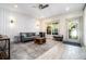 Cozy living room with shiplap walls, modern lighting and comfortable seating at 1100 Wylie Se St # A, Atlanta, GA 30316
