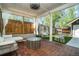 Covered outdoor patio featuring comfortable seating, stylish ceiling fan, and a backyard at 1100 Wylie Se St # A, Atlanta, GA 30316