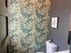 Stylish powder room features decorative wallpaper and modern fixtures, creating a welcoming space at 1100 Wylie Se St # A, Atlanta, GA 30316