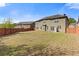 Fenced backyard offering a private outdoor space with a mix of lawn and shade at 4279 Two Bridge Dr, Buford, GA 30518