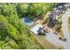 Aerial view of community amenities including a swimming pool, tennis court, and playground at 4279 Two Bridge Dr, Buford, GA 30518