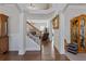 Elegant foyer with hardwood floors, featuring a staircase and decorative furnishings at 4279 Two Bridge Dr, Buford, GA 30518