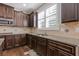 Stylish kitchen showcasing stainless steel appliances, granite countertops, and tile backsplash at 4279 Two Bridge Dr, Buford, GA 30518