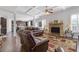 Inviting living room with fireplace, hardwood flooring, and plenty of natural light at 4279 Two Bridge Dr, Buford, GA 30518