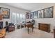 Spacious home office with built-in shelving, natural light, and a comfortable workspace at 4279 Two Bridge Dr, Buford, GA 30518