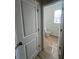 Half-bath featuring hardwood floors and window at 4520 Ajo Walk, Atlanta, GA 30331