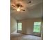 Spacious bedroom with neutral carpet and ample natural light from two windows at 4520 Ajo Walk, Atlanta, GA 30331