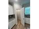 Walk-in pantry offers ample storage space, next to modern kitchen at 4520 Ajo Walk, Atlanta, GA 30331