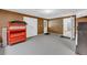 Unfinished basement area with concrete floor, multiple entryways, and two door closet at 3311 Lost Meadows Ln, Buford, GA 30519