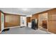 Spacious unfinished basement area with concrete floor, utility access, and exterior door to backyard at 3311 Lost Meadows Ln, Buford, GA 30519