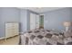 Relaxing bedroom boasting neutral carpeting with furniture accents, and bright doors at 3311 Lost Meadows Ln, Buford, GA 30519