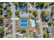 Aerial shot of community tennis courts and swimming pool in residential neighborhood at 3311 Lost Meadows Ln, Buford, GA 30519