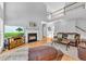 Spacious living room features a fireplace, hardwood floors, and a view of the upper floor at 3311 Lost Meadows Ln, Buford, GA 30519
