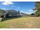 Sprawling backyard with well-maintained lawn and privacy fencing, perfect for outdoor activities at 419 Farmwood Way, Canton, GA 30115