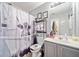 Charming bathroom featuring a novelty shower curtain, vanity, and ample storage space at 419 Farmwood Way, Canton, GA 30115
