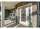 Charming front door with decorative wreath, sidelights, and a welcoming covered porch at 419 Farmwood Way, Canton, GA 30115