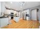 Kitchen boasts stainless appliances, center island, and ample storage in a bright and airy space at 419 Farmwood Way, Canton, GA 30115