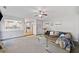 Spacious living room with a neutral carpet, a comfortable couch, and decorative wall art at 419 Farmwood Way, Canton, GA 30115