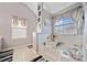 Serene main bathroom featuring a soaking tub, separate shower, and tasteful decor at 419 Farmwood Way, Canton, GA 30115