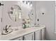 Main bathroom with double sinks, updated fixtures, and vanity at 419 Farmwood Way, Canton, GA 30115